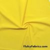 Yellow Solid Nylon Spandex Swimsuit Fabric at FlukyFabrics.com