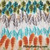 Colorful Feathers and Leaves Sketches on White Cotton Jersey Fabric at FlukyFabrics.com