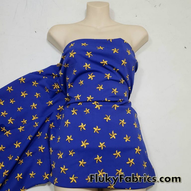 Yellow Starfish on Royal Blue Background Nylon Spandex Fabric