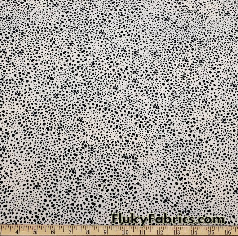 Black Pebbles on a Light Vanilla Cream Background Poly Spandex Fabric