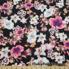Orchid Flowers Print on a Black Background Lightweight Cotton Spandex Fabric at FlukyFabrics.com