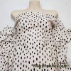 On Trend Black Irregular Oval Dots Print on an Ivory Background Nylon Spandex Fabric