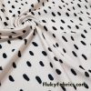 On Trend Black Irregular Oval Dots Print on an Ivory Background Nylon Spandex Fabric