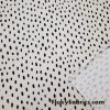 On Trend Black Irregular Oval Dots Print on an Ivory Background Nylon Spandex Fabric