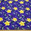 Yellow Orchids and Foliage Print on Purple UV/Blacklight Reactive Swimsuit Nylon Spandex Fabric at FlukyFabrics.com