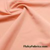 Creamy Peach Solid Nylon Spandex Swimwear Fabric at FlukyFabrics.com