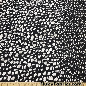 Abstract Rocks and Orange Border Waves Print Bikini Swimsuit Nylon Spandex Fabric at FlukyFabrics.com