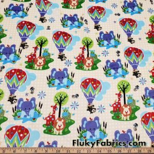 Minky Fabric with Cute Baby Animals on a Yellow Pattern Background at FlukyFabrics.com