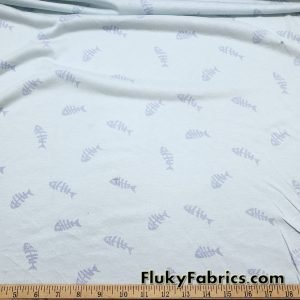 Blue Fish on Light Blue Lightweight Poly Rayon Spandex Jersey Fabric at FlukyFabrics.com