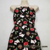 Small Dogs, Apples, Flowers and Hearts on a Black Background Cotton Spandex Fabric