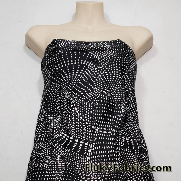 Abstract White Swarming Pebbles on Black Nylon Spandex Swimsuit Fabric