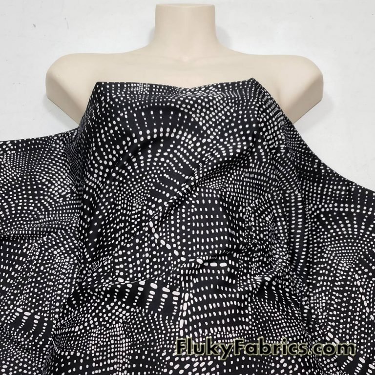Abstract White Swarming Pebbles on Black Nylon Spandex Swimsuit Fabric