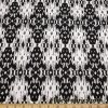 Ikat Black and Off White Cotton Spandex Apparel Fabric at FlukyFabrics.com