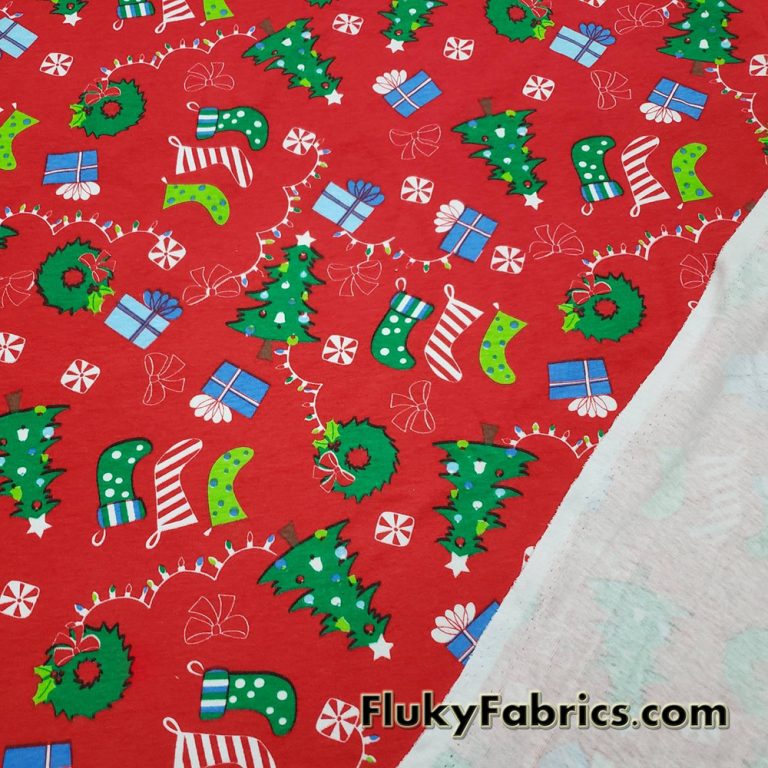 Christmas Motifs on a Red Background Cotton Rib Fabric