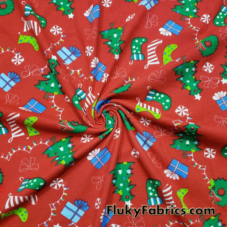 Christmas Motifs on a Red Background Cotton Rib Fabric