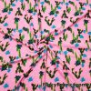 Green and Blue Cactus Plants Over a Bright Pink Nylon Spandex Swimwear Fabric