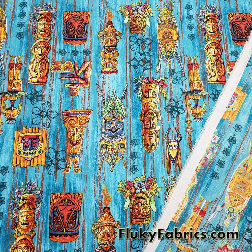 Tiki Masks on Blue Print 44″ Wide Cotton Woven Fabric