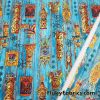 Tiki Masks on Blue Print 44″ Wide Cotton Woven Fabric