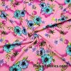 Aqua and Blue Flowers with Palm Trees on Pink Nylon Spandex Swimsuit Fabric
