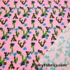 Green and Blue Cactus Plants Over a Bright Pink Nylon Spandex Swimwear Fabric