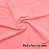 Salmon Solid Nylon Spandex Swimwear Fabric at FlukyFabrics.com