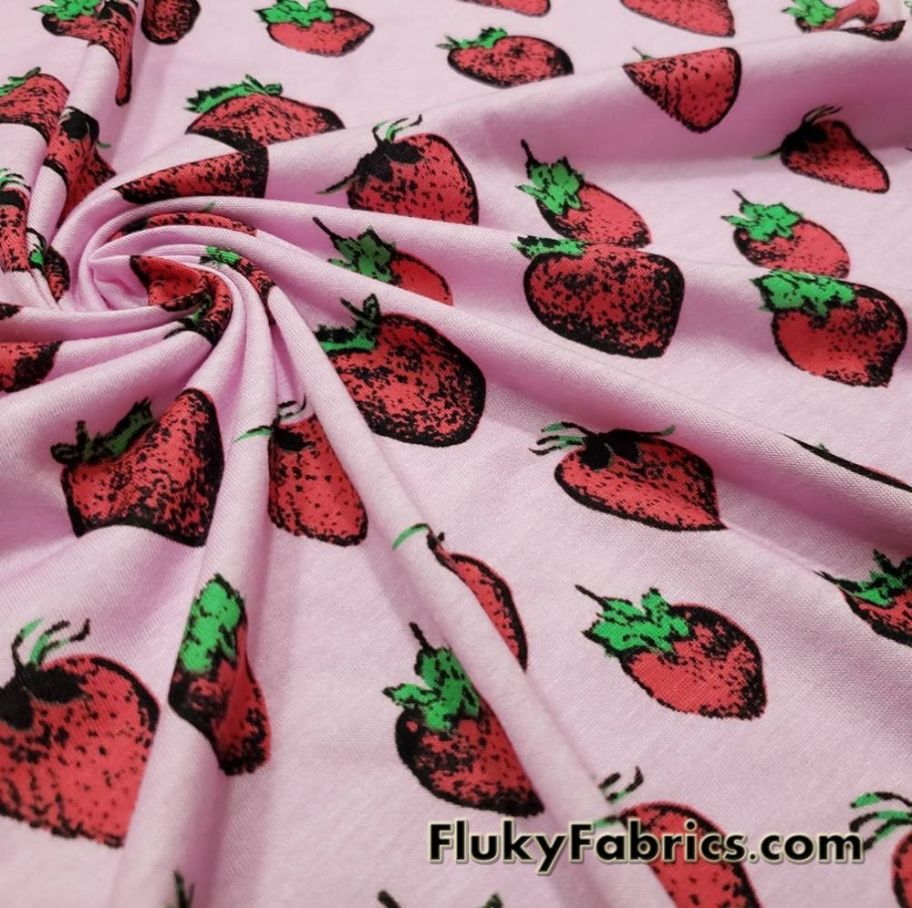 Strawberries on Light Orchid Pink Lightweight Poly Rayon Jersey Fabric