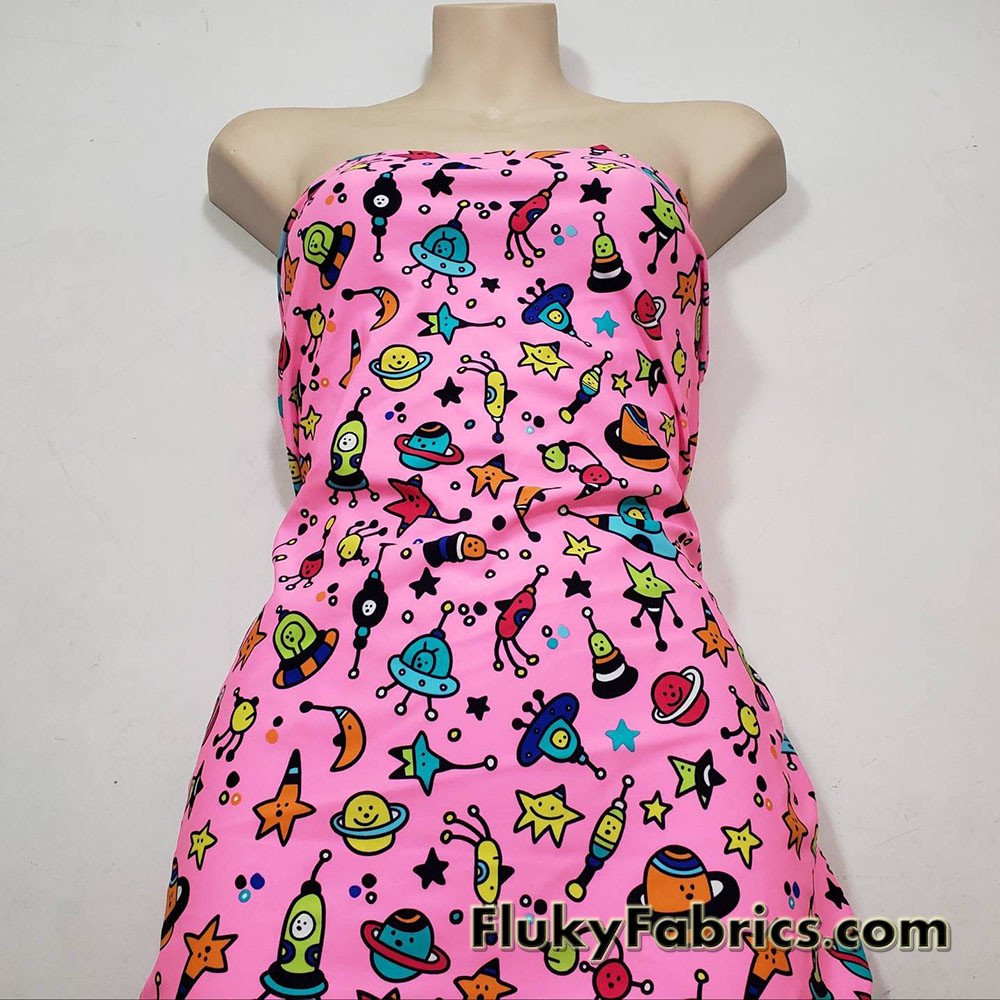 Colorful Space Doodles Over a Bright Pink Nylon Spandex Swimwear Fabric