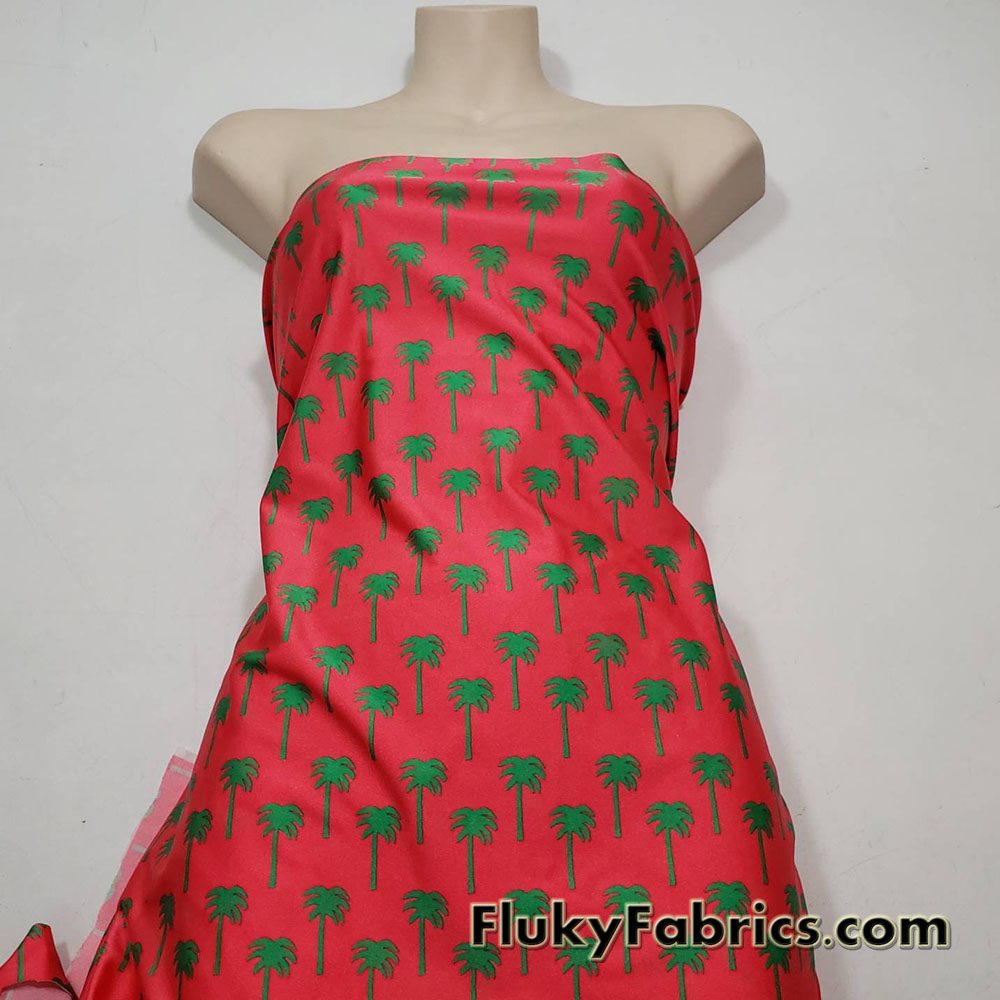 Green Palm Trees Silhouettes Print on Red Nylon Spandex swimsuit Fabric Cuts Measuring 32″x60″