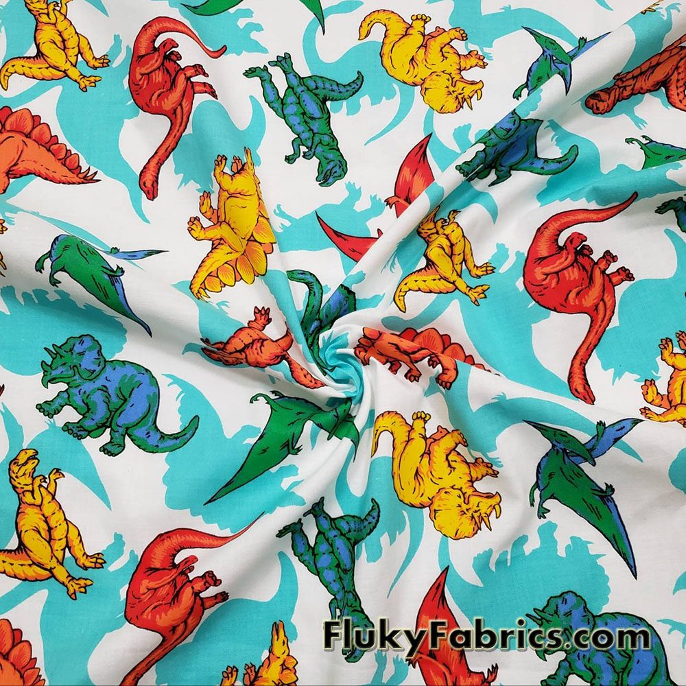 Dinosaur Delight 100% Cotton Woven Fabric – Colorful Dinosaurs on White