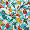 Dinosaur Delight 100% Cotton Woven Fabric – Colorful Dinosaurs on White