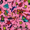 Colorful Space Doodles Over a Bright Pink Nylon Spandex Swimwear Fabric