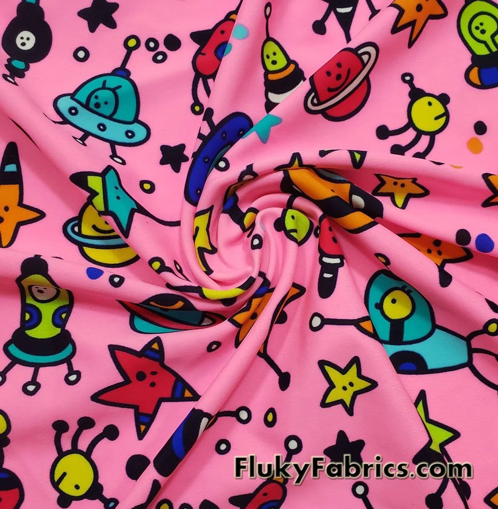 Colorful Space Doodles Over a Bright Pink Nylon Spandex Swimwear Fabric
