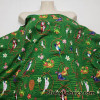 Tropical Birds, Flowers and Tiki Masks on Dark Green Print Cotton Jersey Fabric