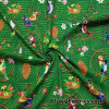 Tropical Birds, Flowers and Tiki Masks on Dark Green Print Cotton Jersey Fabric