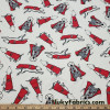 Super Mutt Print on Ivory Cotton Jersey Fabric at FlukyFabrics.com