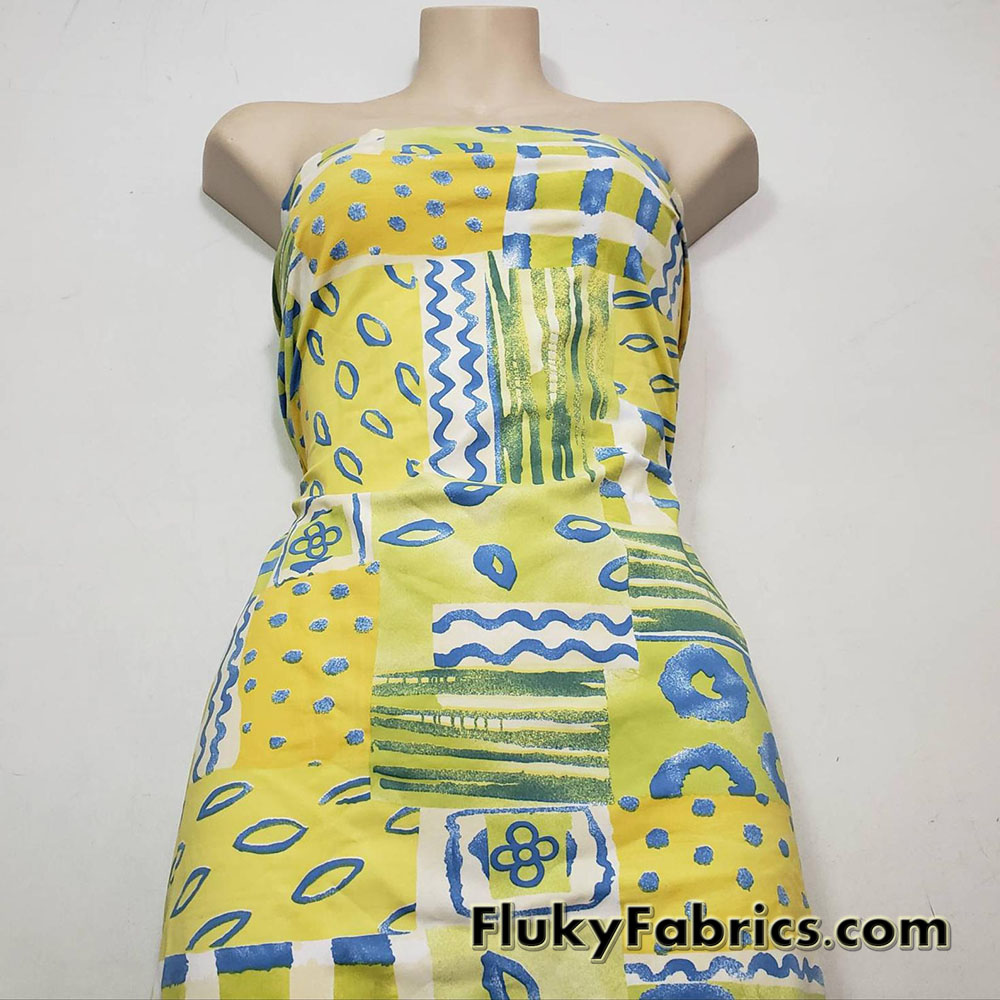 Shades of Yellow, Green and Blue Ethnic Abstract Print Nylon Spandex 4 Way Stretch Fabric