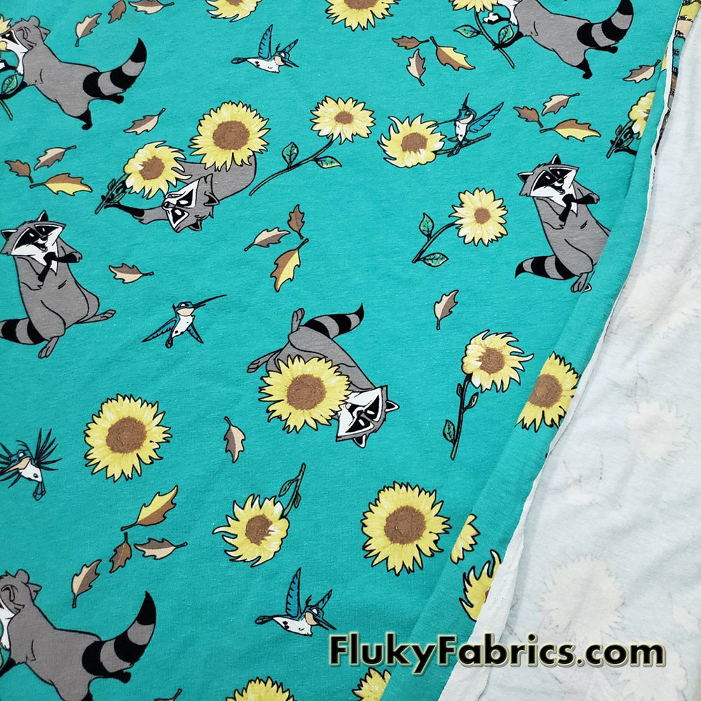 Raccoons, Hummingbirds and Sunflowers on Aqua Cotton Spandex Fabric