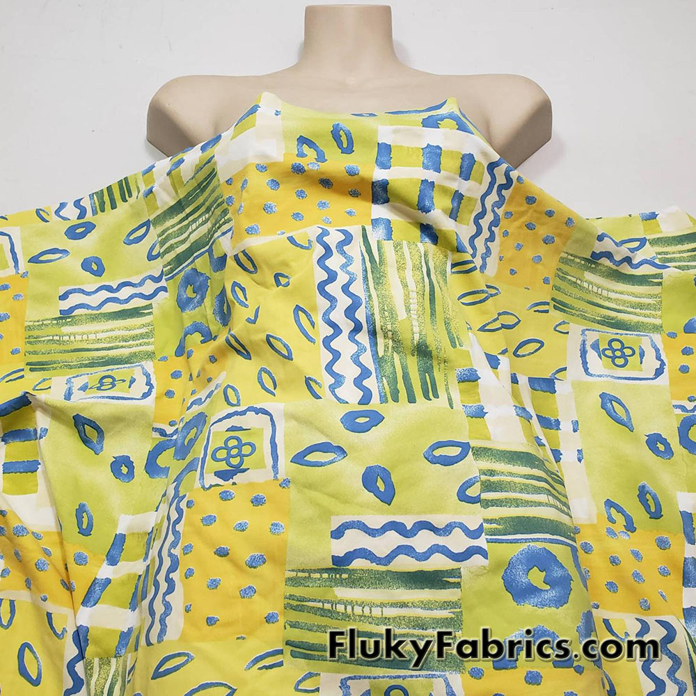 Shades of Yellow, Green and Blue Ethnic Abstract Print Nylon Spandex 4 Way Stretch Fabric