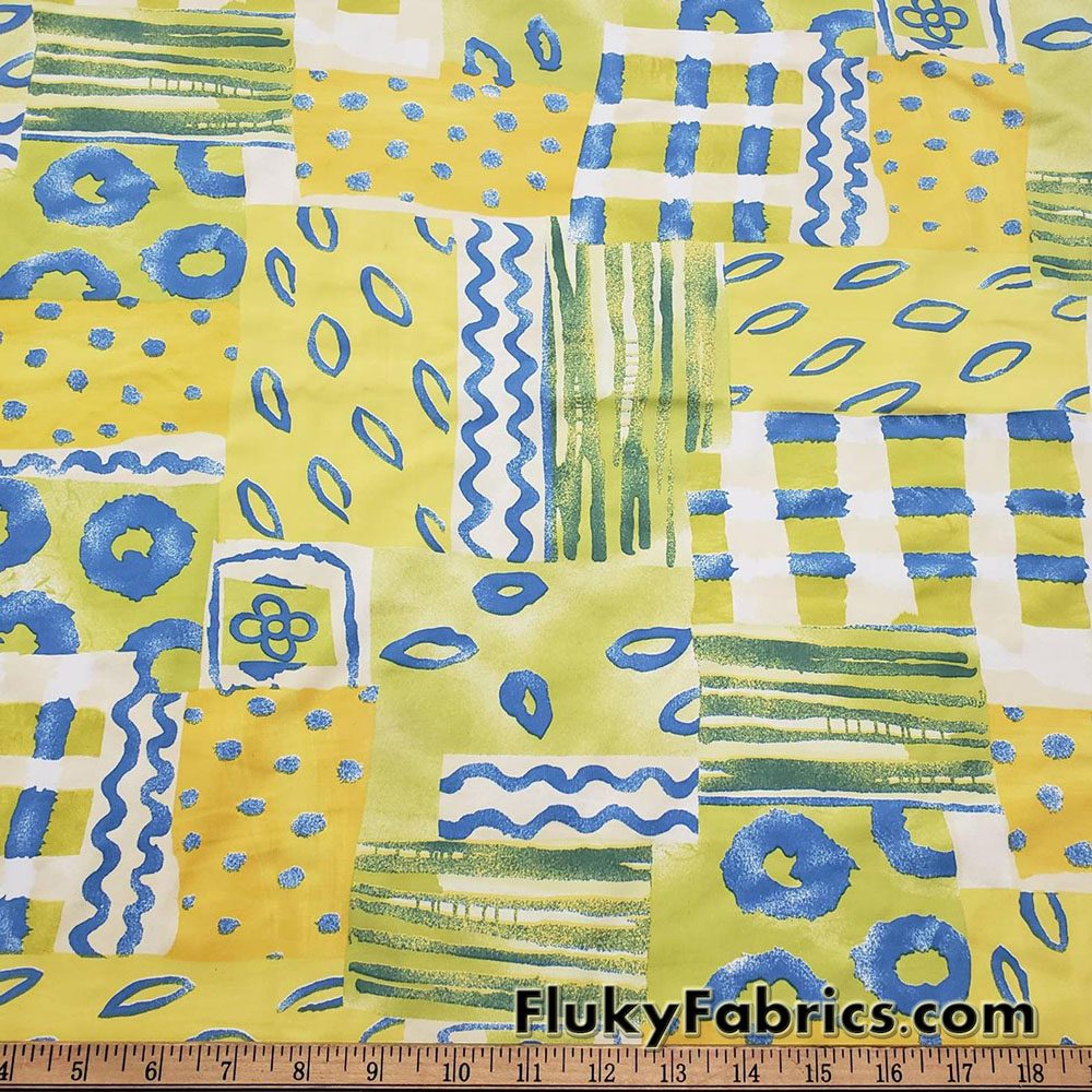 Shades of Yellow, Green and Blue Ethnic Abstract Print Nylon Spandex 4 Way Stretch Fabric