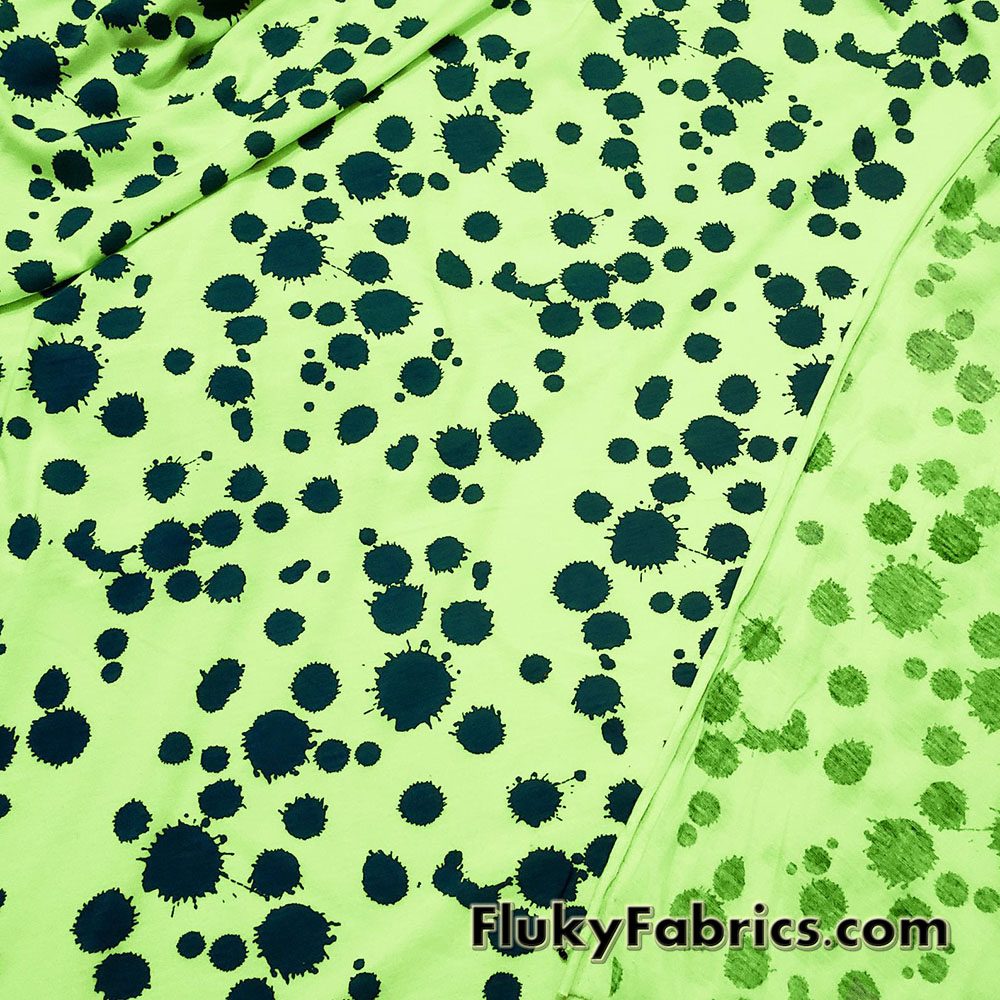 Navy Paint Splotches Over a Bright Lime Poly Cotton Jersey Fabric By The Yard