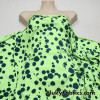 Navy Paint Splotches Over a Bright Lime Poly Cotton Jersey Fabric By The Yard