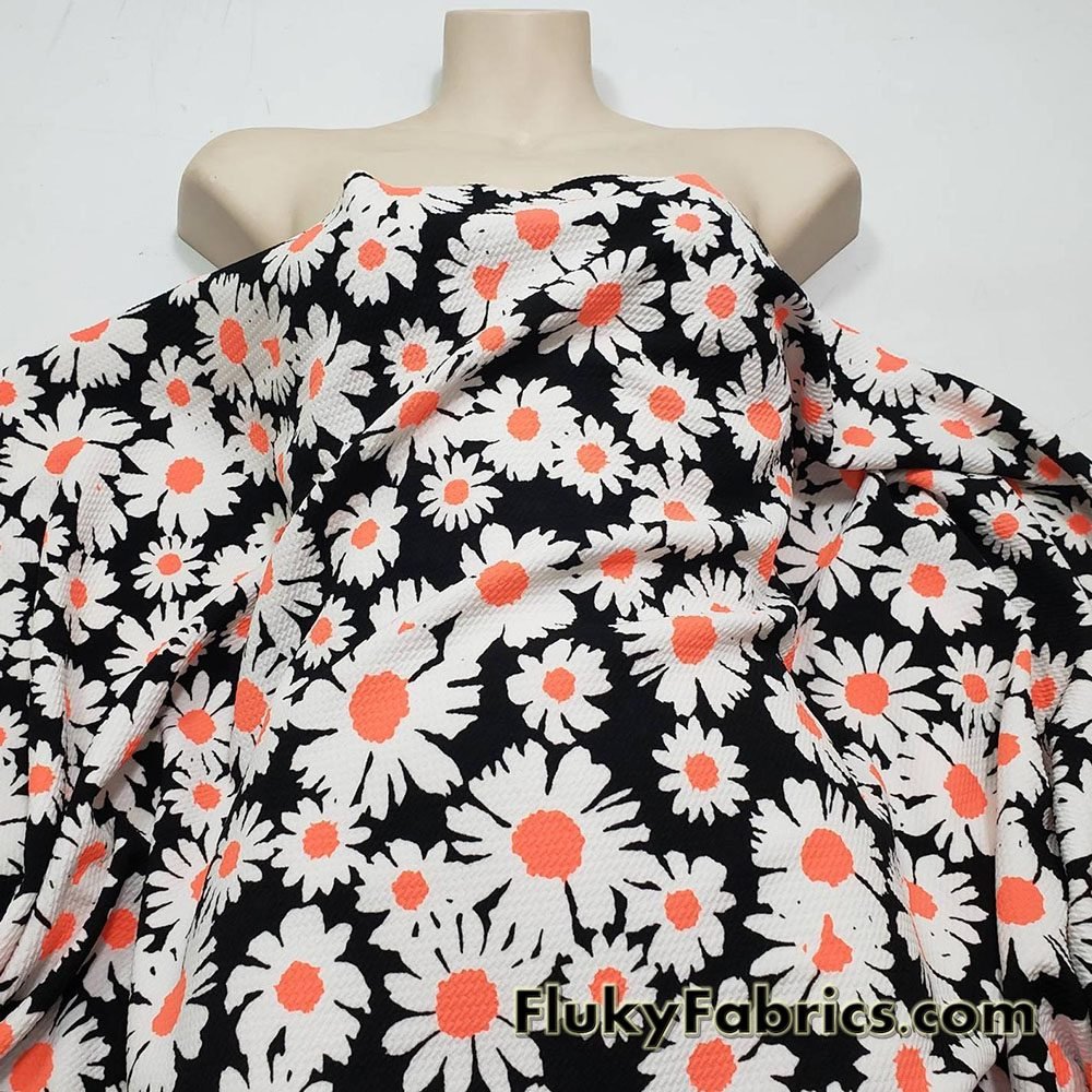 White 4 way stretch poly liverpool fabric with red all over roses green leaves design sold by the yard