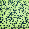 Navy Paint Splotches Over a Bright Lime Poly Cotton Jersey Fabric By The Yard