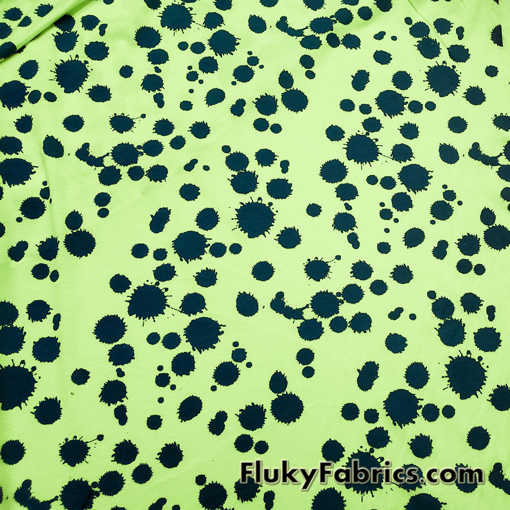 Navy Paint Splotches Over a Bright Lime Poly Cotton Jersey Fabric By The Yard