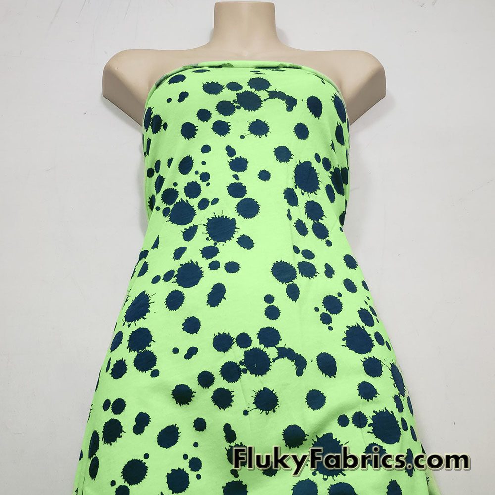 Navy Paint Splotches Over a Bright Lime Poly Cotton Jersey Fabric By The Yard