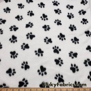 Black Dog Paws on White Fleece Fabric by the Yard at FlukyFabrics.com