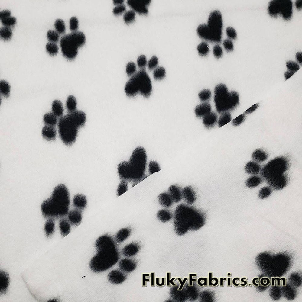 Black Dog Paws on White Fleece Fabric by the Yard