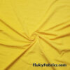 Copacabana Yellow Solid Nylon Spandex Swimwear Fabric at FlukyFabrics.com
