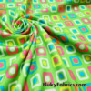 Colorful Squares and Dots on Lime Green Print Poly Spandex Fabric
