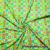 Colorful Squares and Dots on Lime Green Print Poly Spandex Fabric